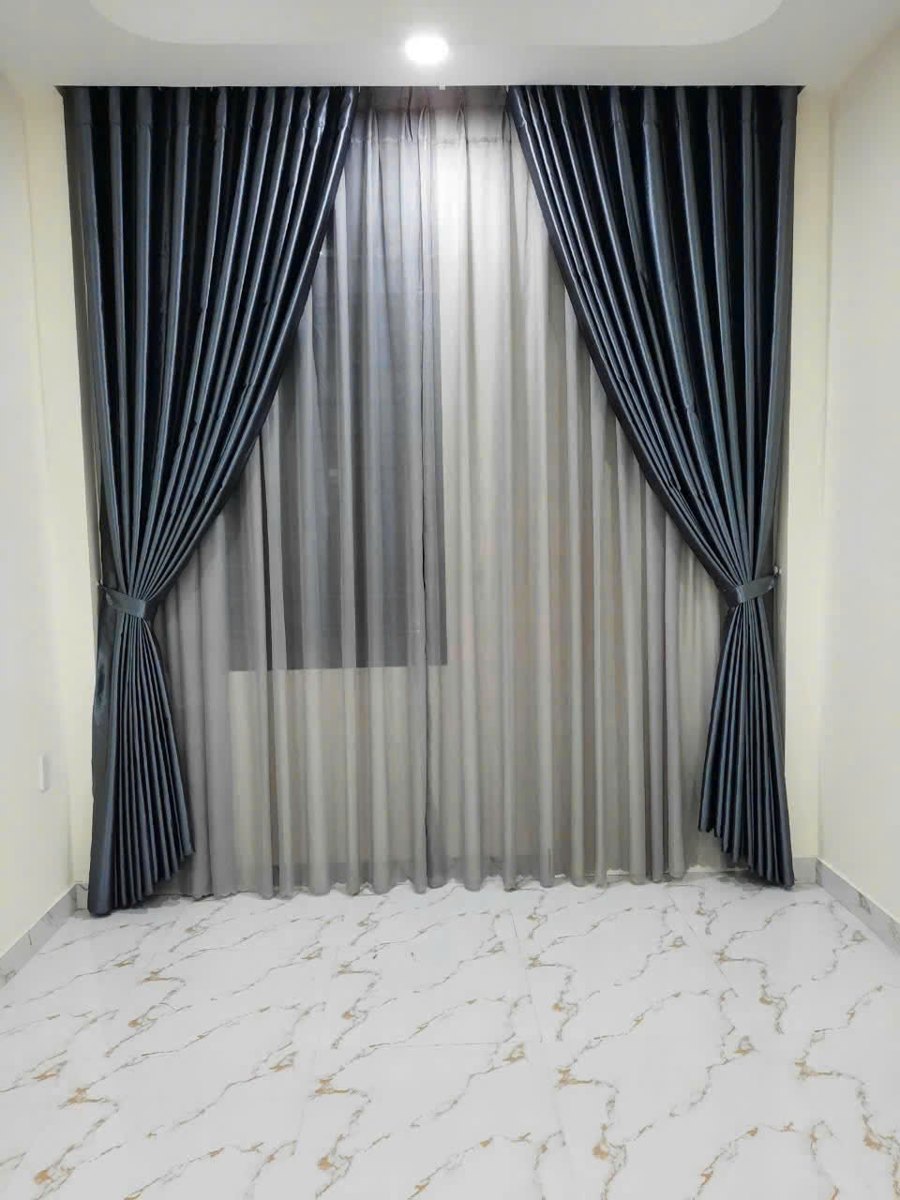 Rèm vải tối màu kết hợp voan sáng tại công trình Tân Bình